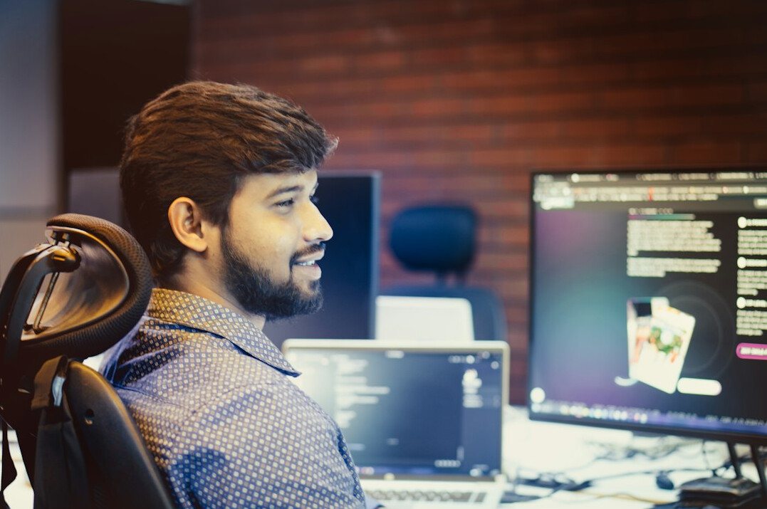 successful programmer smiling